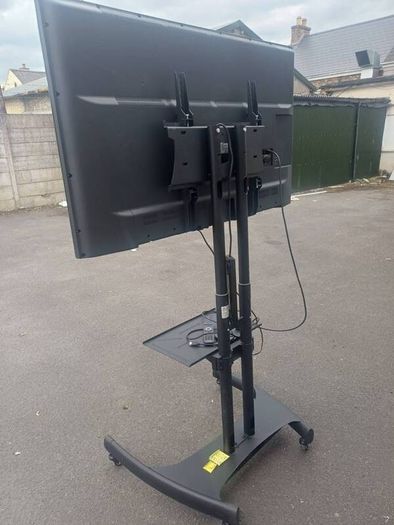 Large Philips TV on Mobile Stand  Ideal for Office Presentation