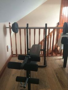 Weight lifting bench with weights
