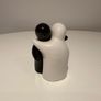 Salt and Pepper People Hugging Image 3