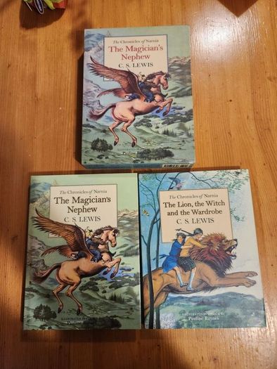 The Chronicals Of Narnia Compilation.  2 Books In Presentation Folder. Large Volume Hardback In Very Good Condition.