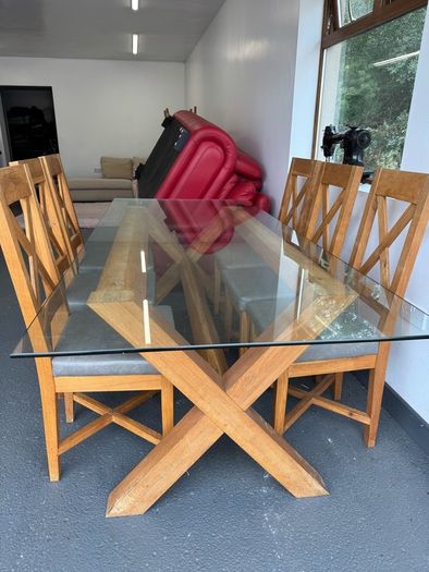 Glass dining room table with 6 chairs