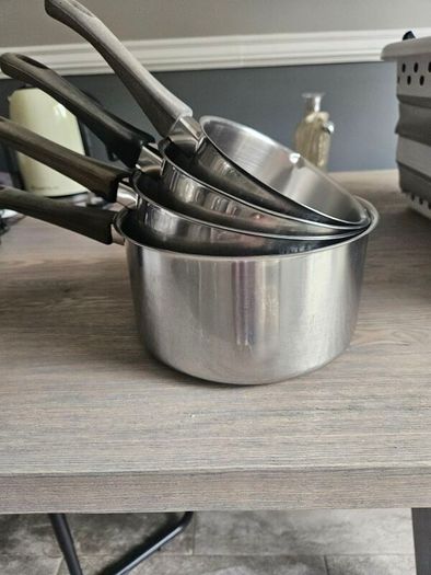 Set of  4 stainless steel saucepans