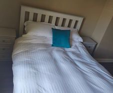 Double bed and two bedside lockers