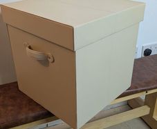 Cream leather box with suede interior. includes lid