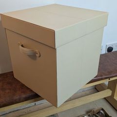 Cream leather box with suede interior. includes lid