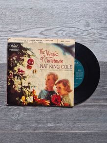 The Magic of Christmas" by Nat King Cole, released in 1960 Capitol Records EAP-1-1444