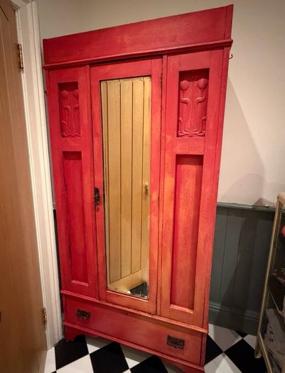 Antique wardrobe painted red