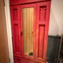 Antique wardrobe painted red Image 2