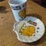 vintage ceramic cup and matching shell-shaped dish set featuring  cartoon yellow elephant "Sunny Funnies" Image 6