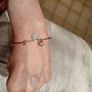 Silver tone adjustable bracelet with charms Image 6