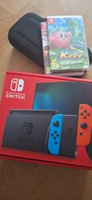 Nintendo Switch and accessories plus 2 games