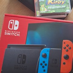 Nintendo Switch and accessories plus 2 games