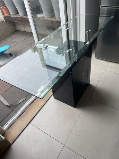 Glass table top and marble base