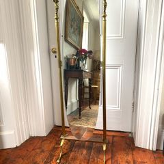 Brass Cheval Mirror with Cherub Finials.