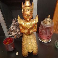 Carved wooden Deity