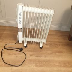 Oil filled 11 fin, 2500W Electric Radiator