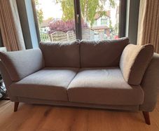 2 x Two seater dark grey couch and footstool - excellent condition