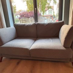 2 x Two seater grey couches and footstool
