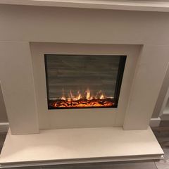 Electric fire and natural stone fireplace