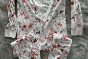 Christmas onesie with a cute bow at the back, 3-4 years (will fit a bigger child)