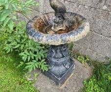 bird bath appox 2ft tall with stone bird