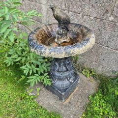 bird bath appox 2ft tall with stone bird