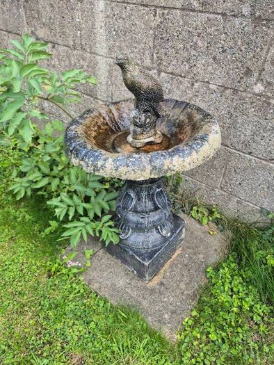 bird bath appox 2ft tall with stone bird