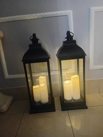 Floor lanterns standing 27 ins high and 21 ins width