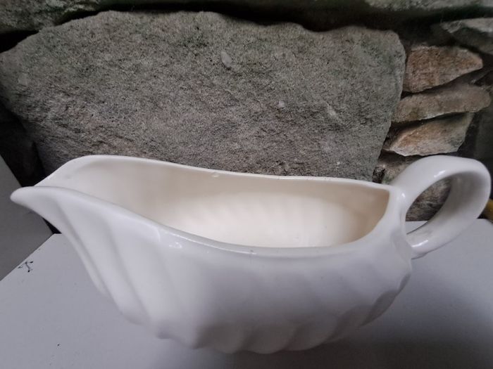 Large ivory gravy jug