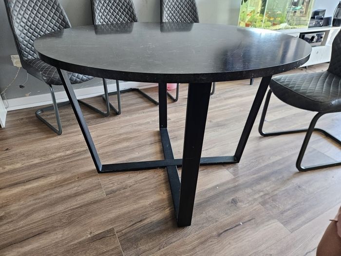 Round dining table with a matching coffee table