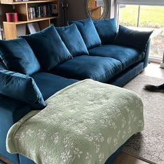 Velvet sofa with right hand chaise end