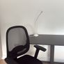 Standing desk with an office chair and desk lamp Image 2