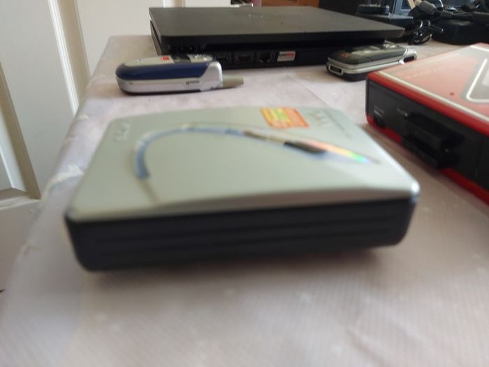 Sony Walkman and Sanyo AM-FM Stereo cassette Player, excellent cosmetic condition, no cables or batteries