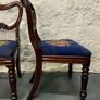 A pair of Victorian mahogany balloon back chairs with tapestry seats. Image 8