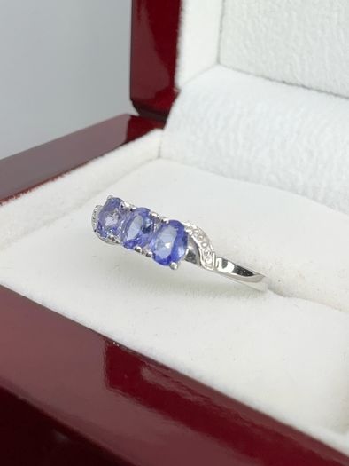 Silver Tanzanite Trilogy Ring in Platinum Overlay Sterling Silver.