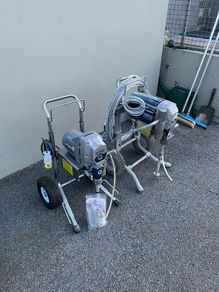 Two airless paint sprayers