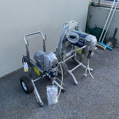 Two airless paint sprayers