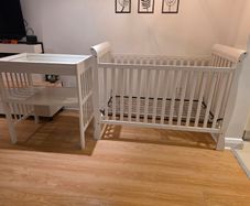 sleigh-style  baby crib and changing table
