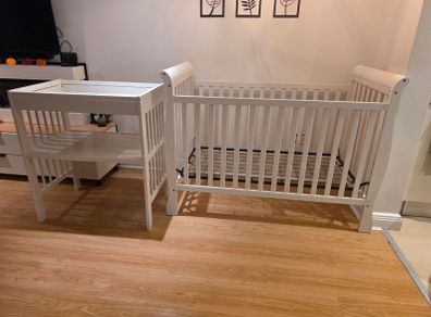 sleigh-style  baby crib and changing table