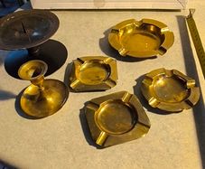 6 different itmes- 1- candle holder 12.00 euro. 2- candle holder round one 10.00 euro. 3- round ashtray12 cm. Dia. 12.00 euro. 4- small  round ashtray9.5 cm. Dia. 9.00 euro. 5-  2 small square ashtray 8 cm. Dia. 9.00 euro each.