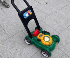 Kids push lawn mower