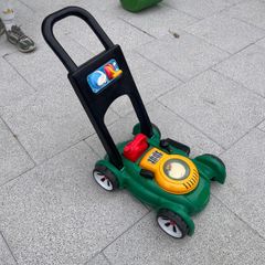 Kids push lawn mower