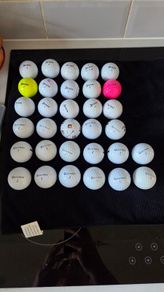 32 srixon and Taylormade balls