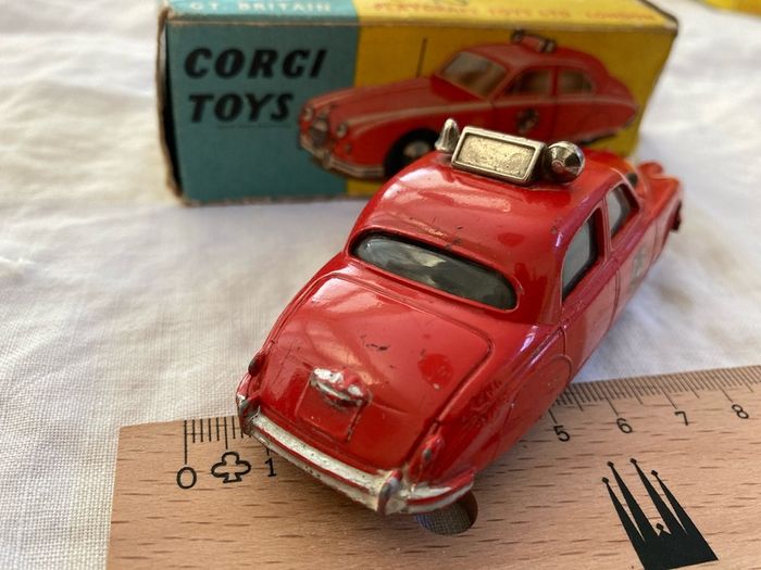 Corgi 213. Jaguar 2.4 Fire Service car. Boxed . Box and model in excellent condition (1959/61)