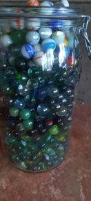 Antique collection of old marbles in large clip sealed jar it's full to the top loft find from very old house in France Beautiful