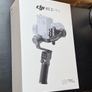 DJI RS 3 Mini with DJI Briefcase Handle and a bag Image 6