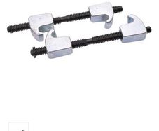 Coil spring compressors