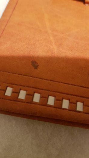 handcrafted made soft leather wallet,with designs ,, thank you,,was used,some wear and tear,,take as is ..