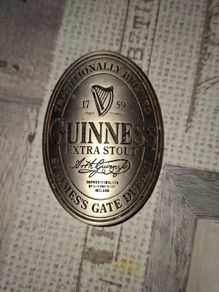 Vintage Metal Advertisement Plaque featuring the classic Guinness Extra Stout bottle label design from St. James's Gate, Dublin Iconic Guinness Harp Logo Postage Available or Collection