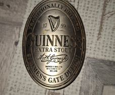 Vintage Metal Advertisement Plaque featuring the classic Guinness Extra Stout bottle label design from St. James's Gate, Dublin Iconic Guinness Harp Logo Postage Available or Collection